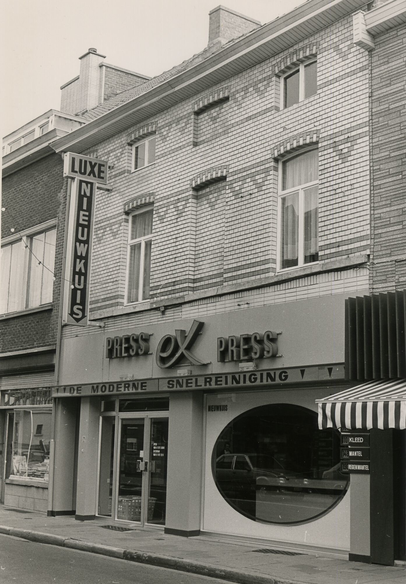 Etalage van nieuwkuis Ex Press in Gent