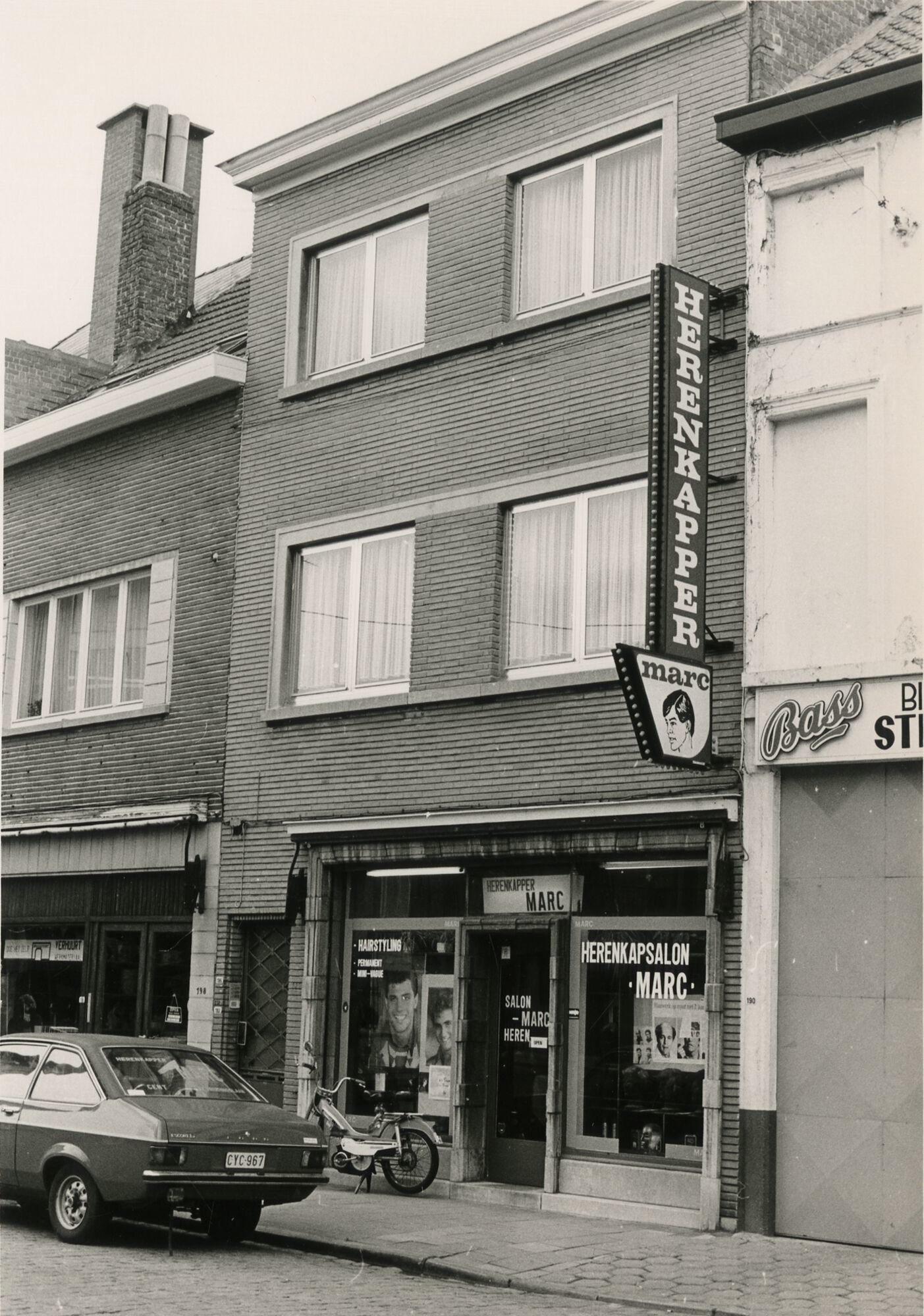 Etalage van kapsalon Marc in Gent