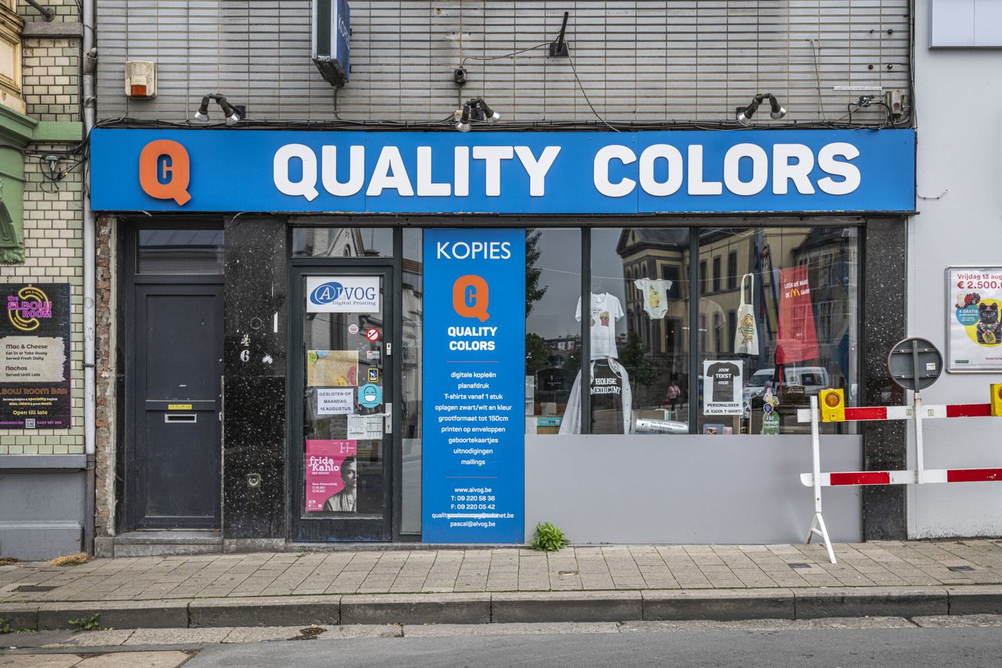 Etalage van kopieercentrum Quality Colors in Gent