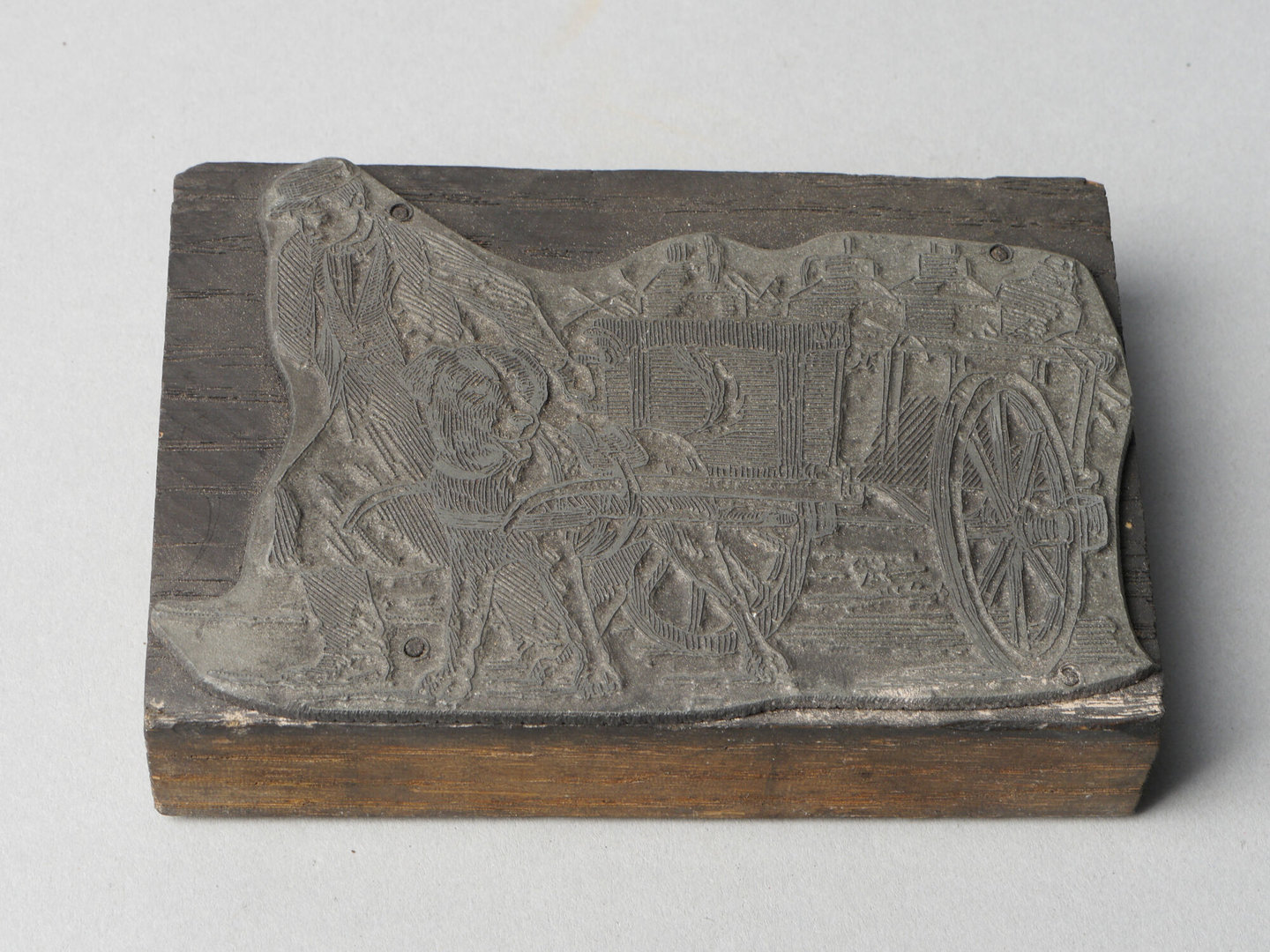 Lijncliché met afbeelding van melkboer met trekhond en geladen hondenkar