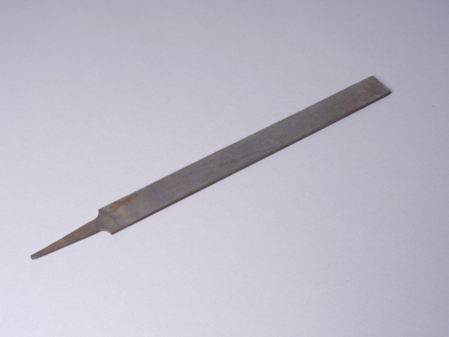 Metaalvijl gebruikt bij machinebouwe Carels in Gent