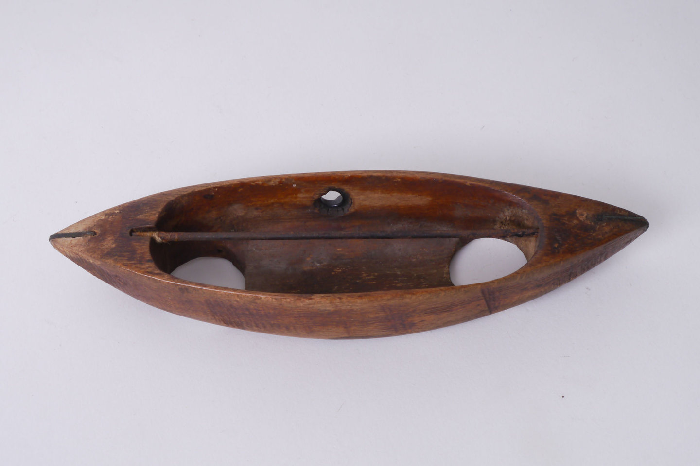 Werpspoel of weefschuitje voor lintweefgetouw