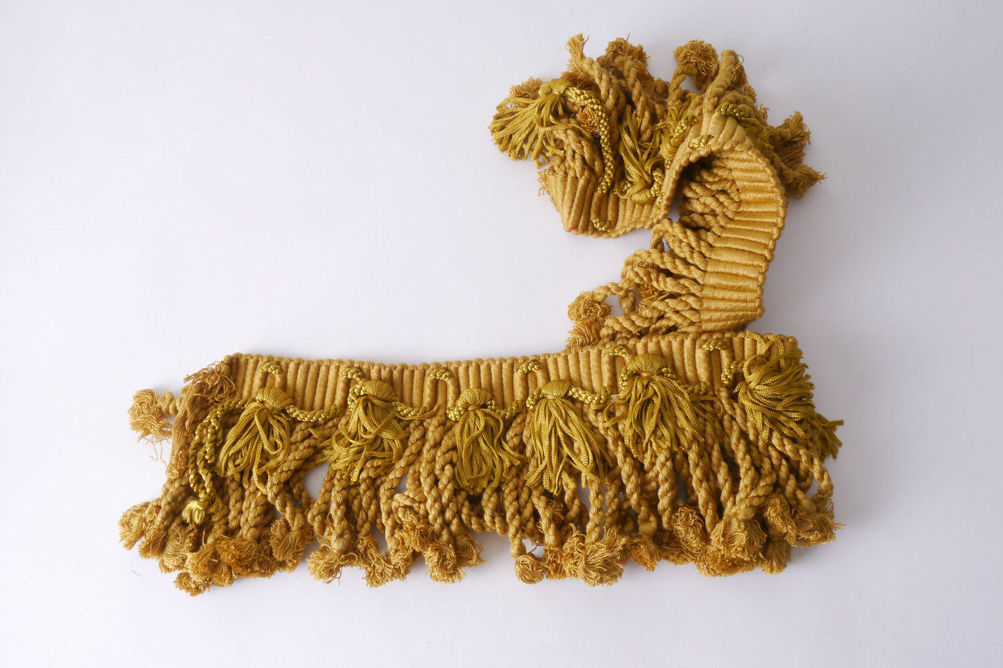 Frange als onderdeel voor het vervaardigen van passement