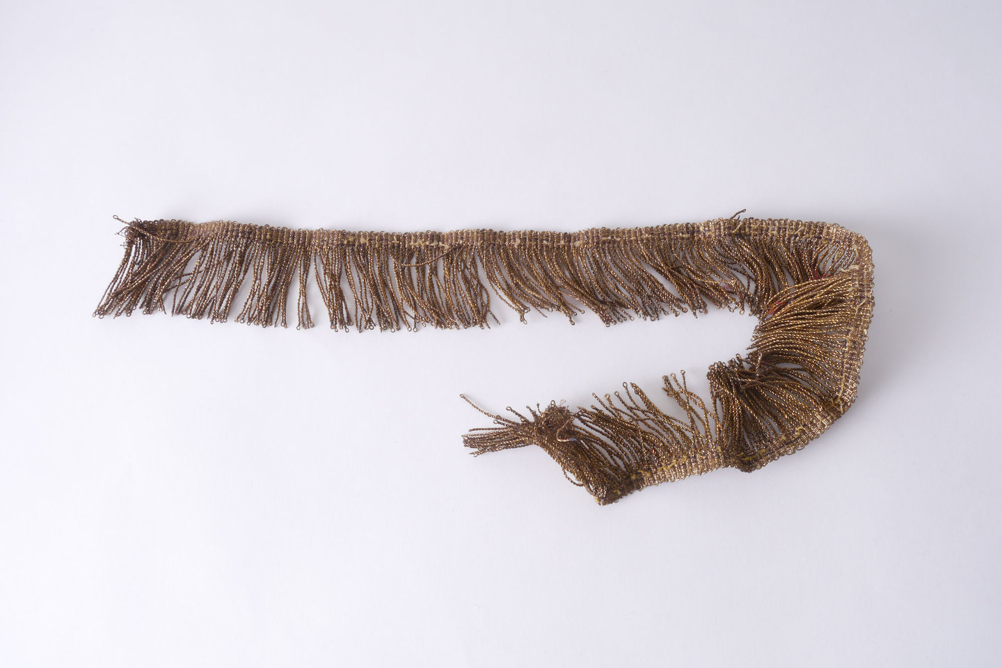 Frange als onderdeel voor het vervaardigen van passement