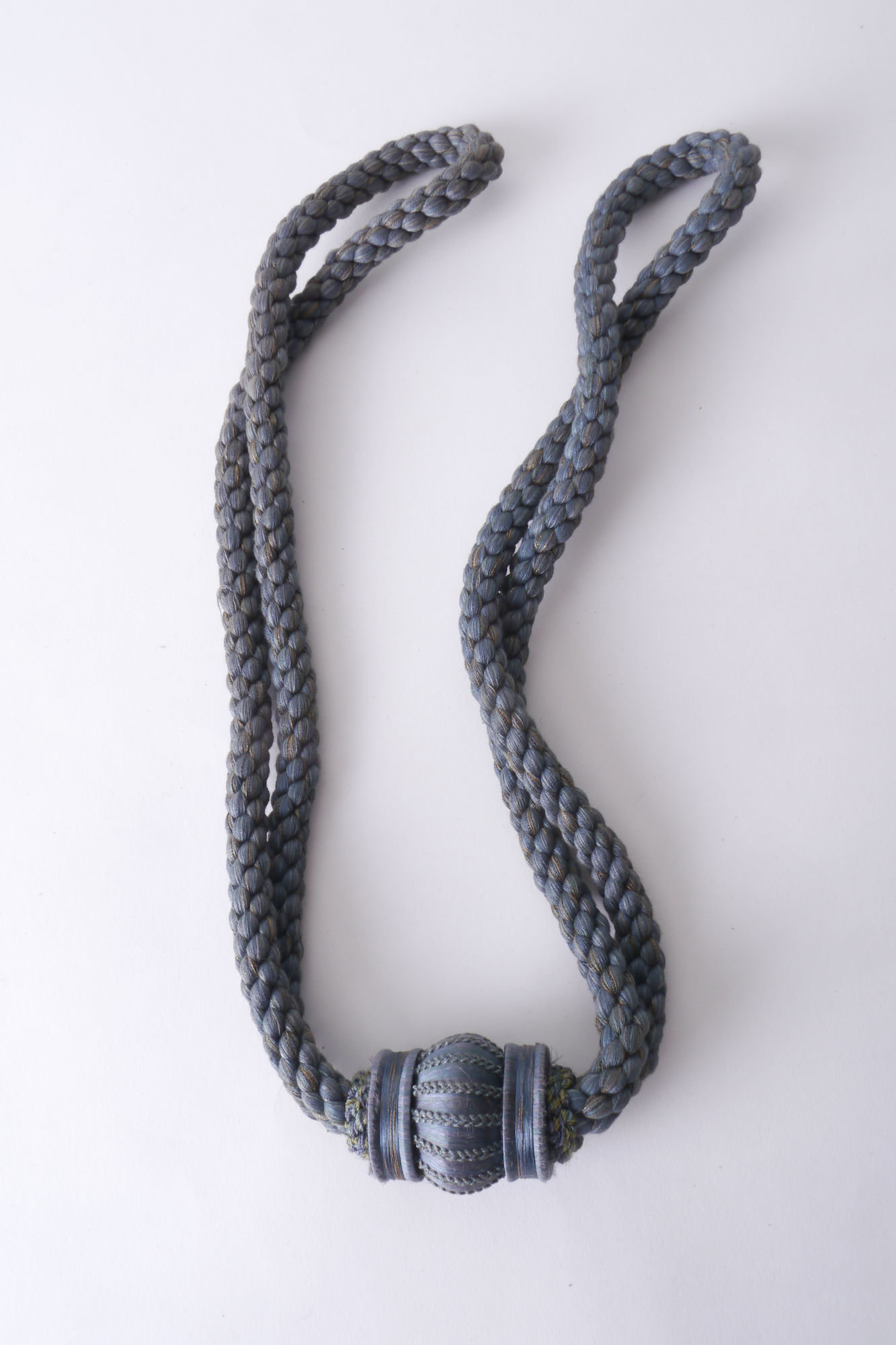 Embrasse câblée of gordijnkoord met schuifring om gordijn open te houden