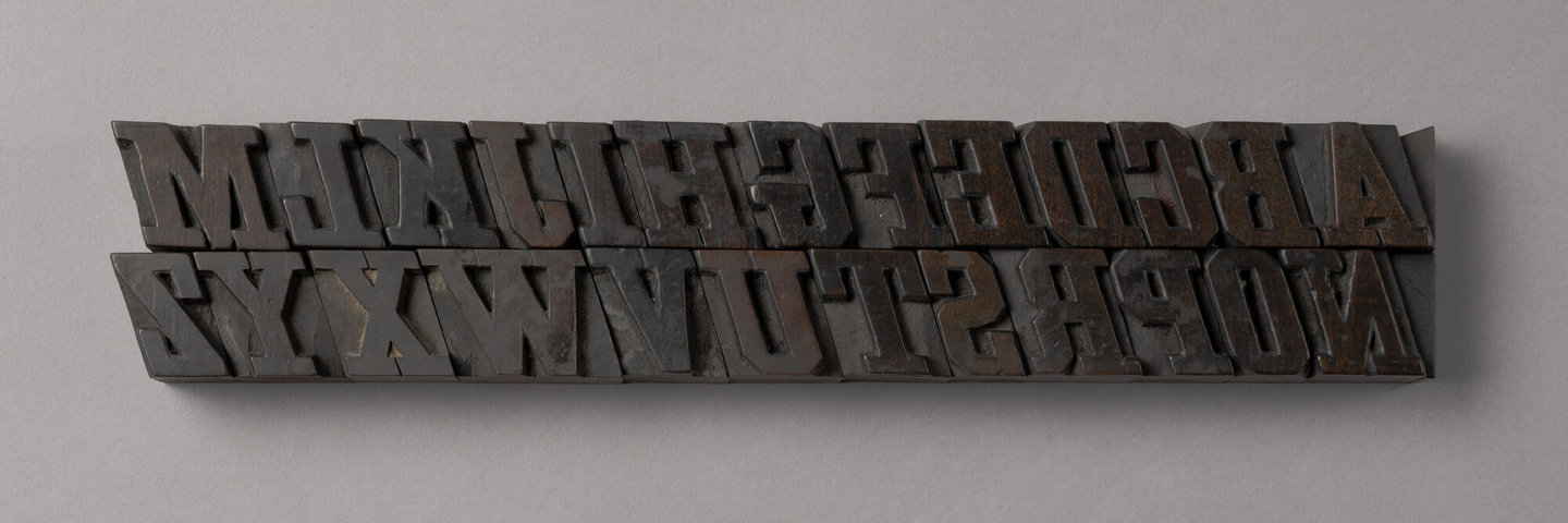Houten drukletters van het type Grecian Italic