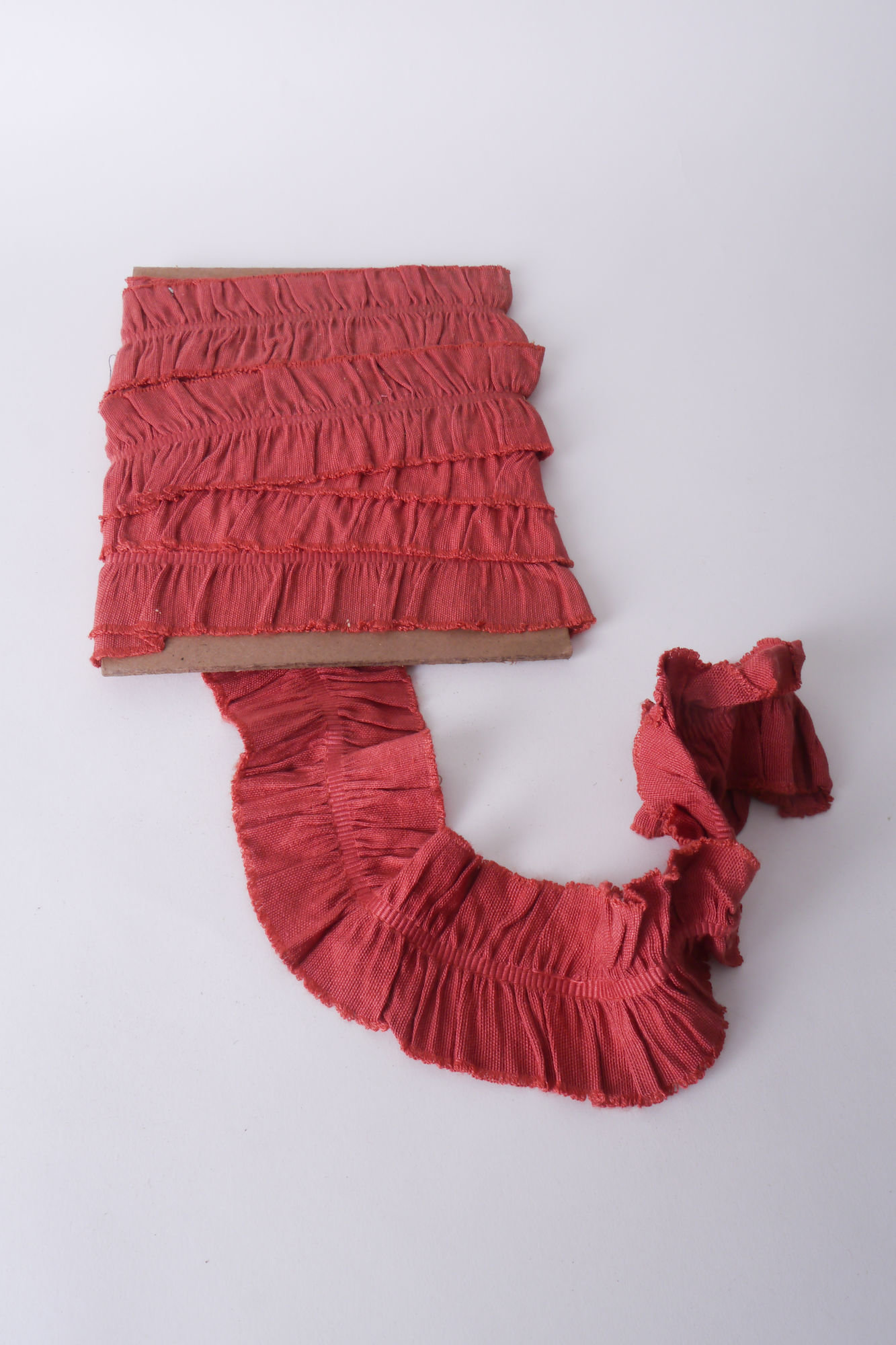 Galon of boord als onderdeel voor het vervaardigen van passement