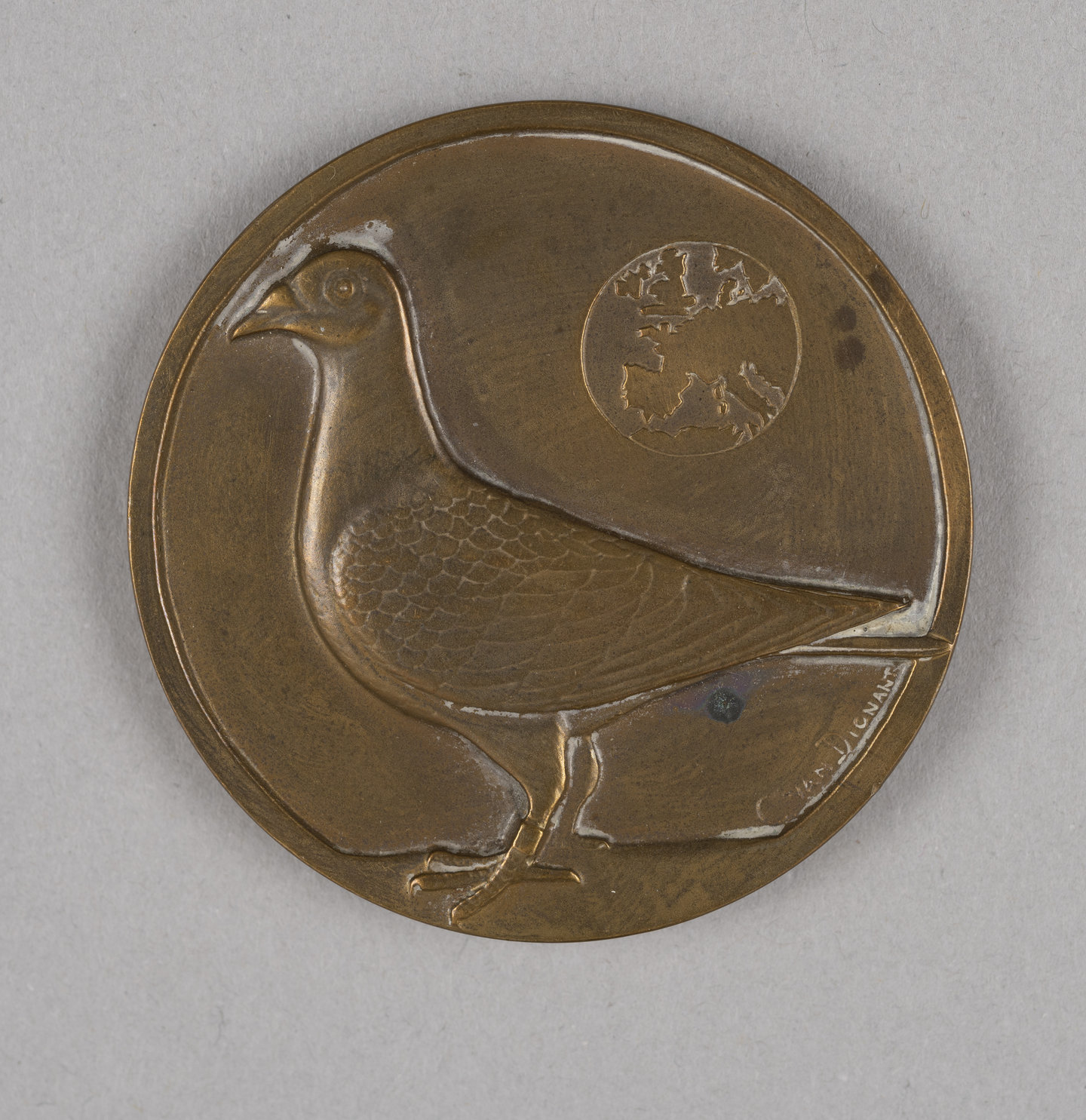 Medaille gewonnen op een keurwedstrijd van duiven georganiseerd door SEM