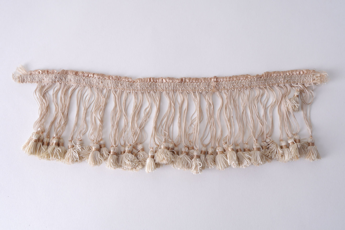 Frange als onderdeel voor het vervaardigen van passement