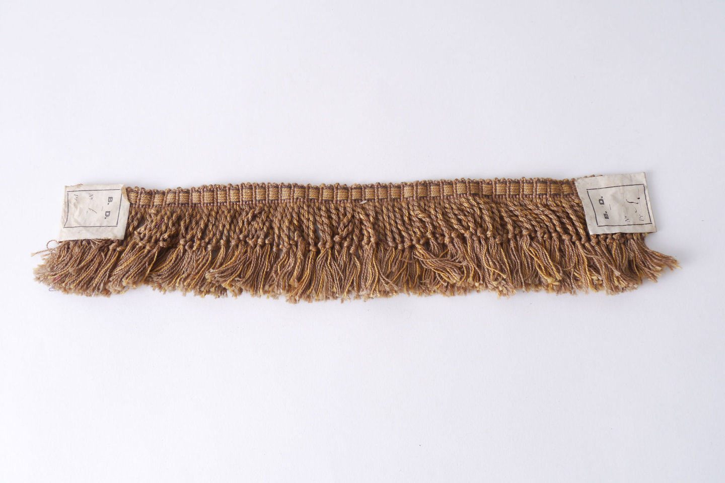 Frange als onderdeel voor het vervaardigen van passement