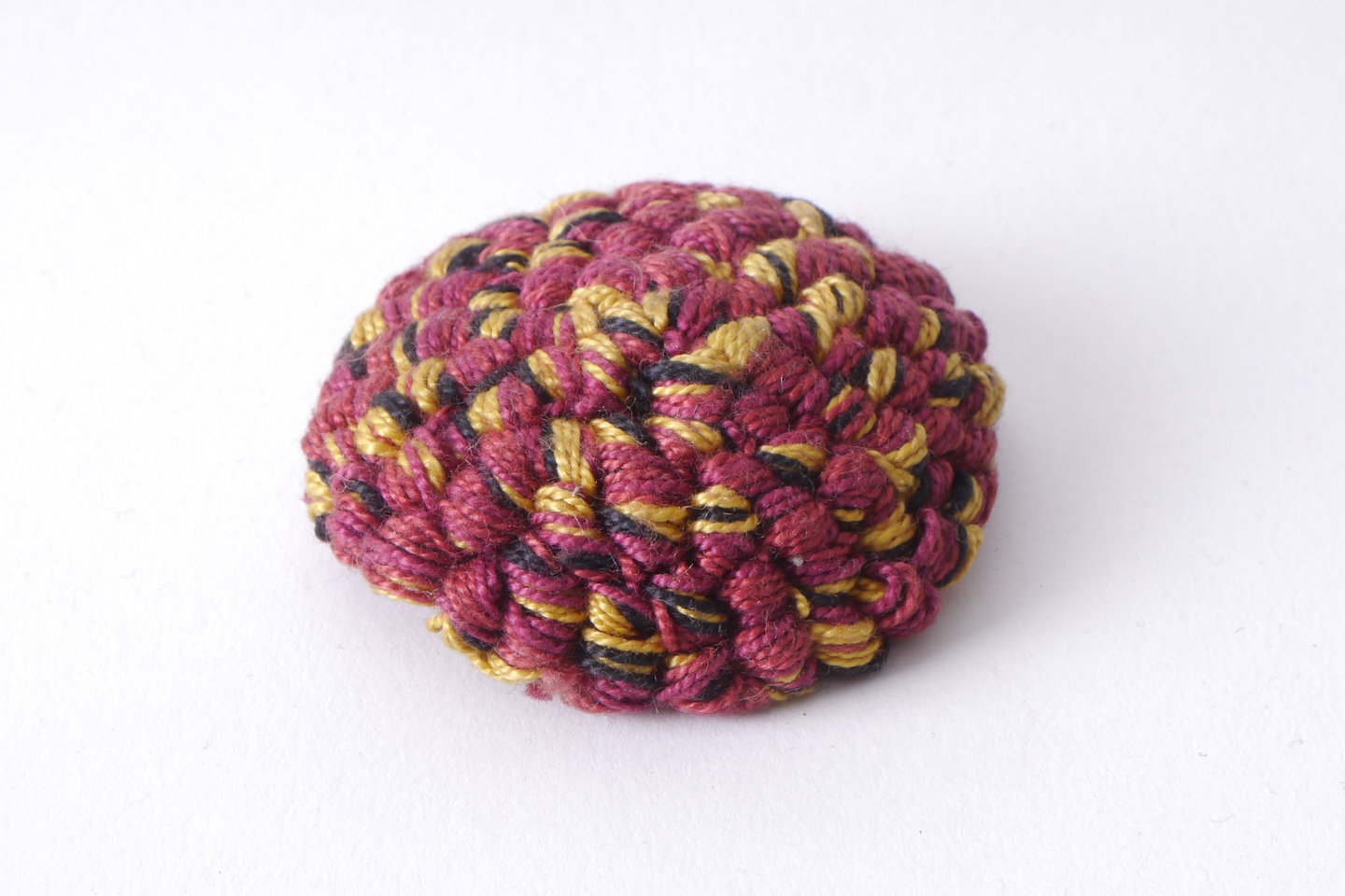 Bouffette als onderdeel voor het vervaardigen van passement