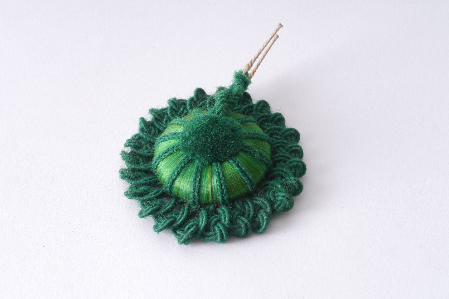 Macaron of rozet als onderdeel voor het vervaardigen van passement