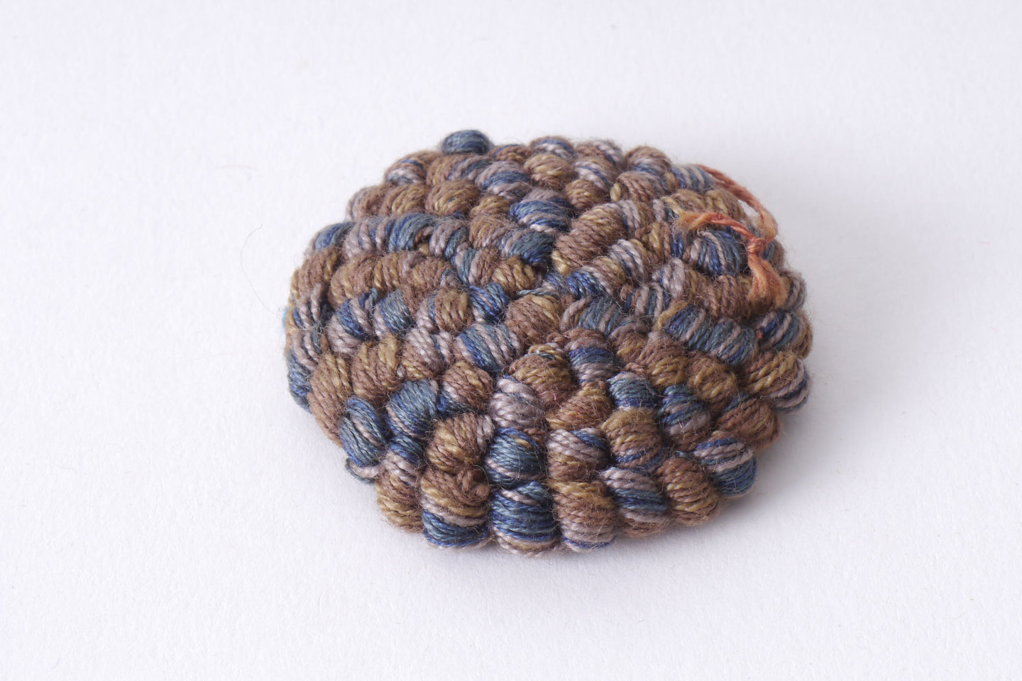 Bouffette als onderdeel voor het vervaardigen van passement