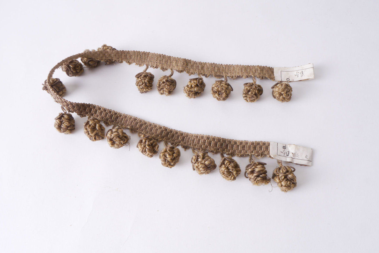 Frange als onderdeel voor het vervaardigen van passement