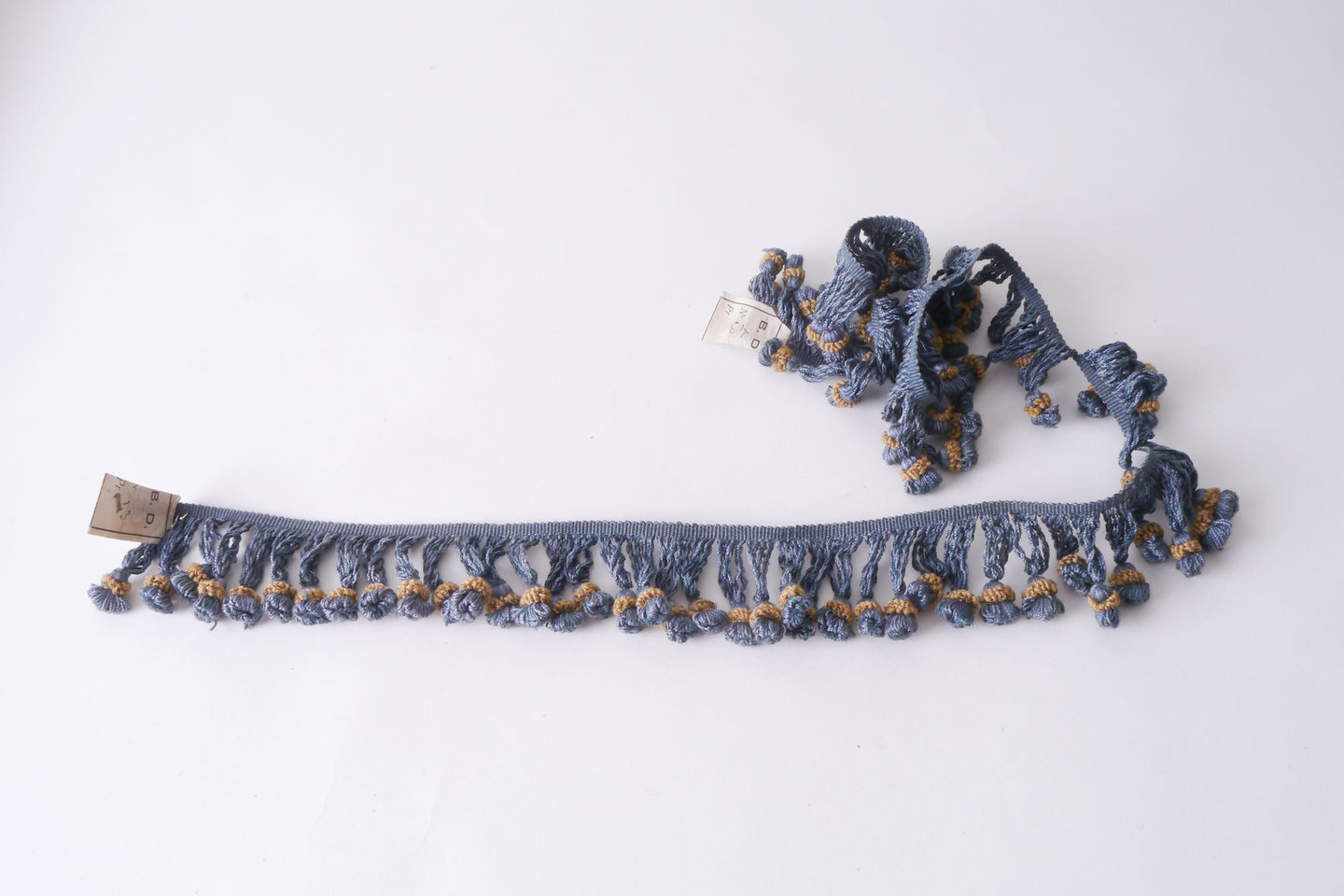 Frange als onderdeel voor het vervaardigen van passement