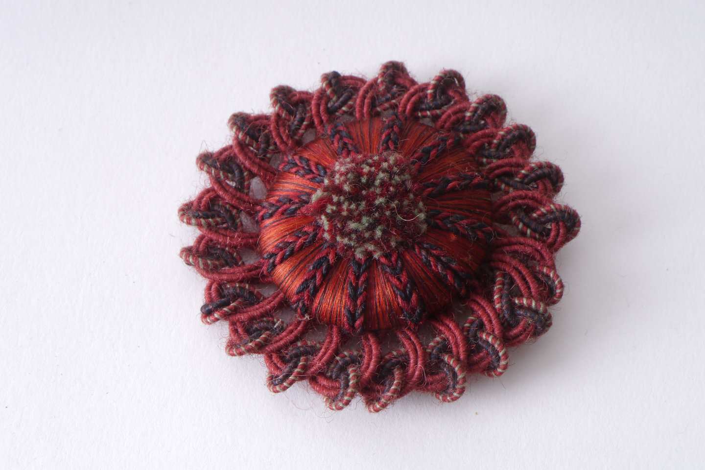 Macaron of rozet als onderdeel voor het vervaardigen van passement