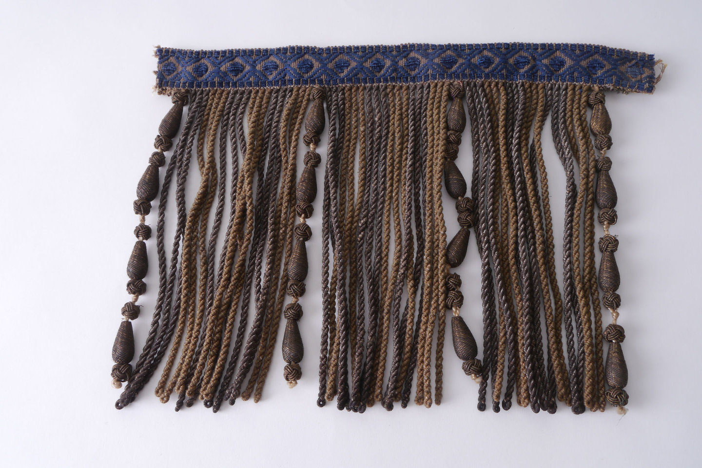 Frange als onderdeel voor het vervaardigen van passement