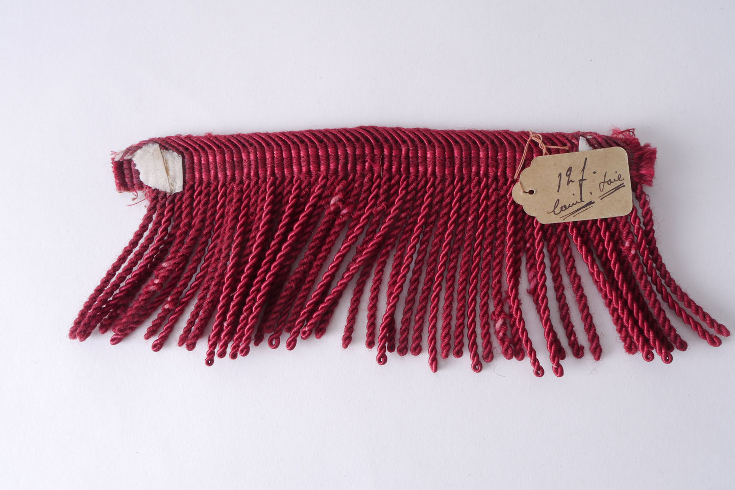 Frange als onderdeel voor het vervaardigen van passement