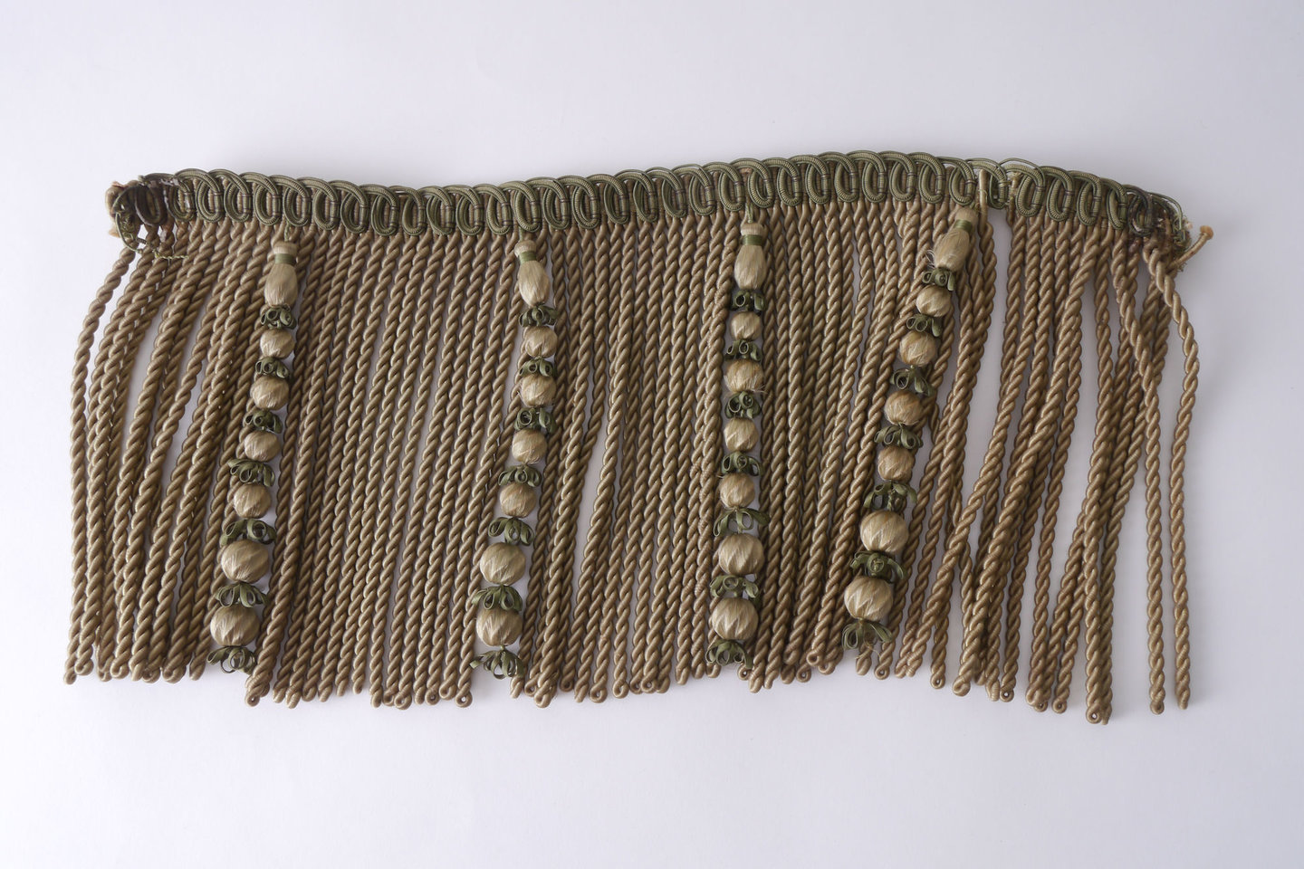 Frange als onderdeel voor het vervaardigen van passement