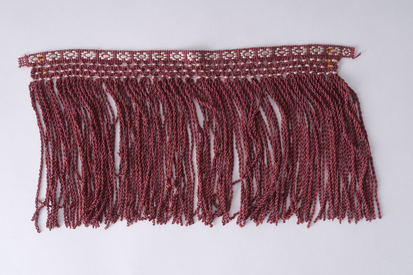 Frange als onderdeel voor het vervaardigen van passement