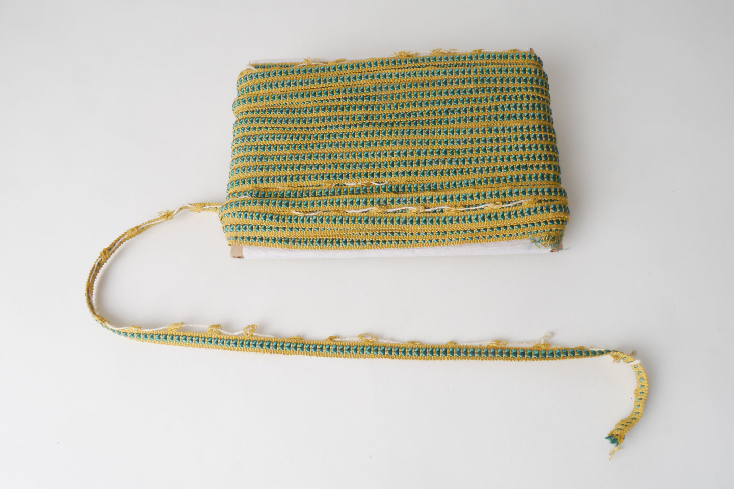 Galon of boord als onderdeel voor het vervaardigen van passement