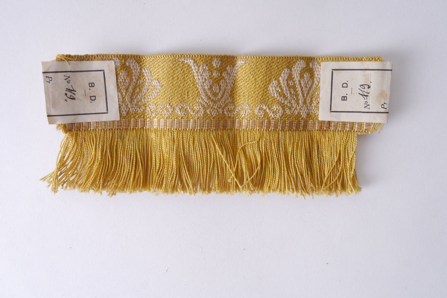 Effilé als onderdeel voor het vervaardigen van passement