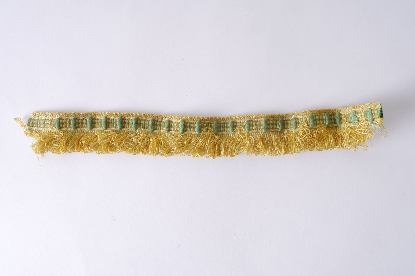 Effilé als onderdeel voor het vervaardigen van passement