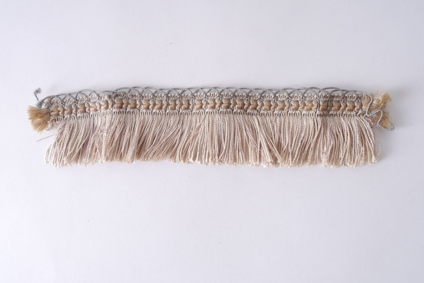 Effilé als onderdeel voor het vervaardigen van passement