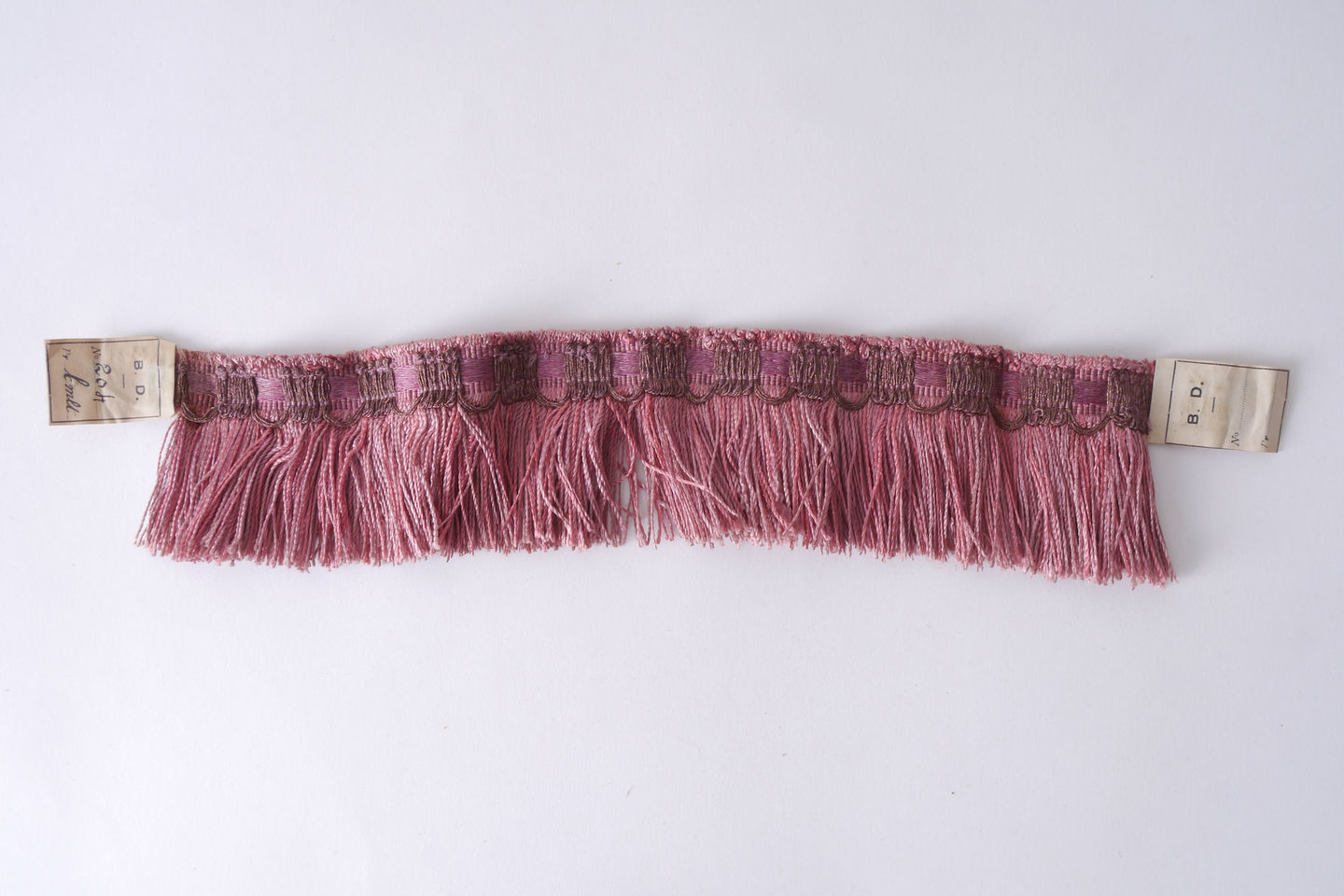 Effilé als onderdeel voor het vervaardigen van passement