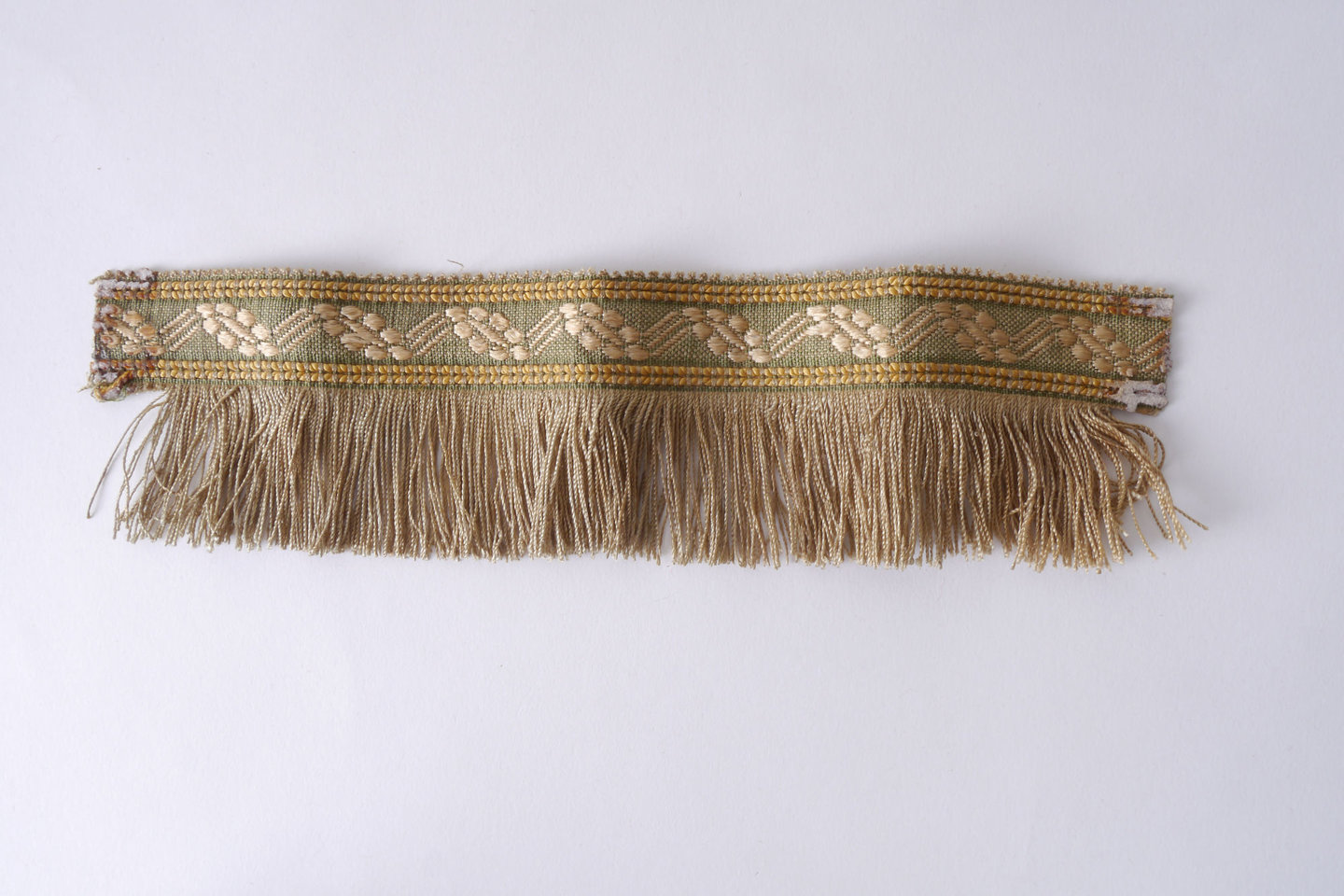 Effilé als onderdeel voor het vervaardigen van passement