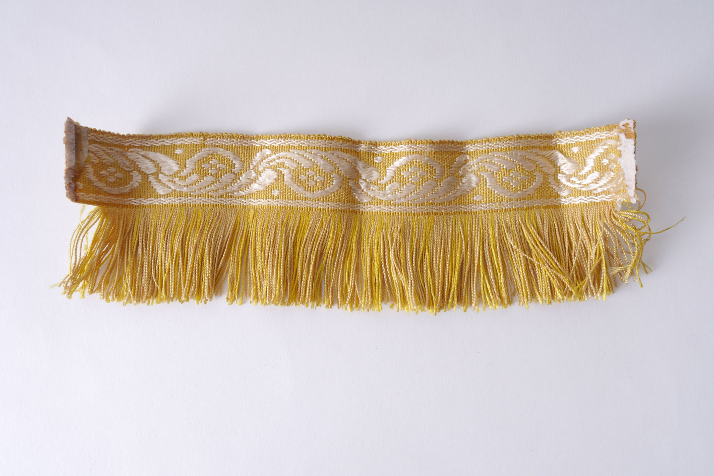 Effilé als onderdeel voor het vervaardigen van passement