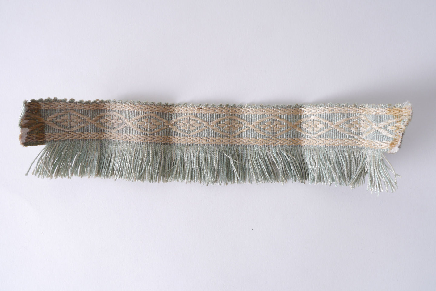 Effilé als onderdeel voor het vervaardigen van passement