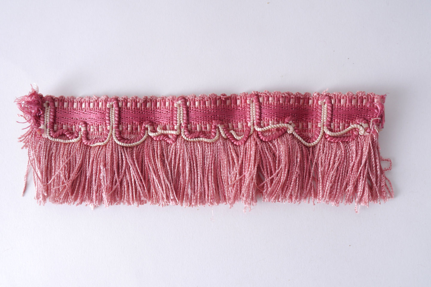 Effilé als onderdeel voor het vervaardigen van passement