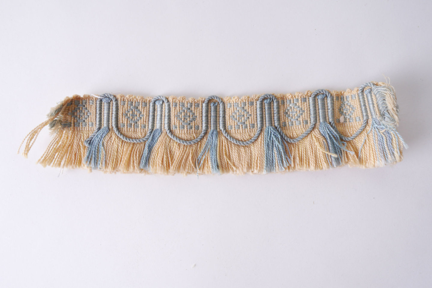 Effilé als onderdeel voor het vervaardigen van passement