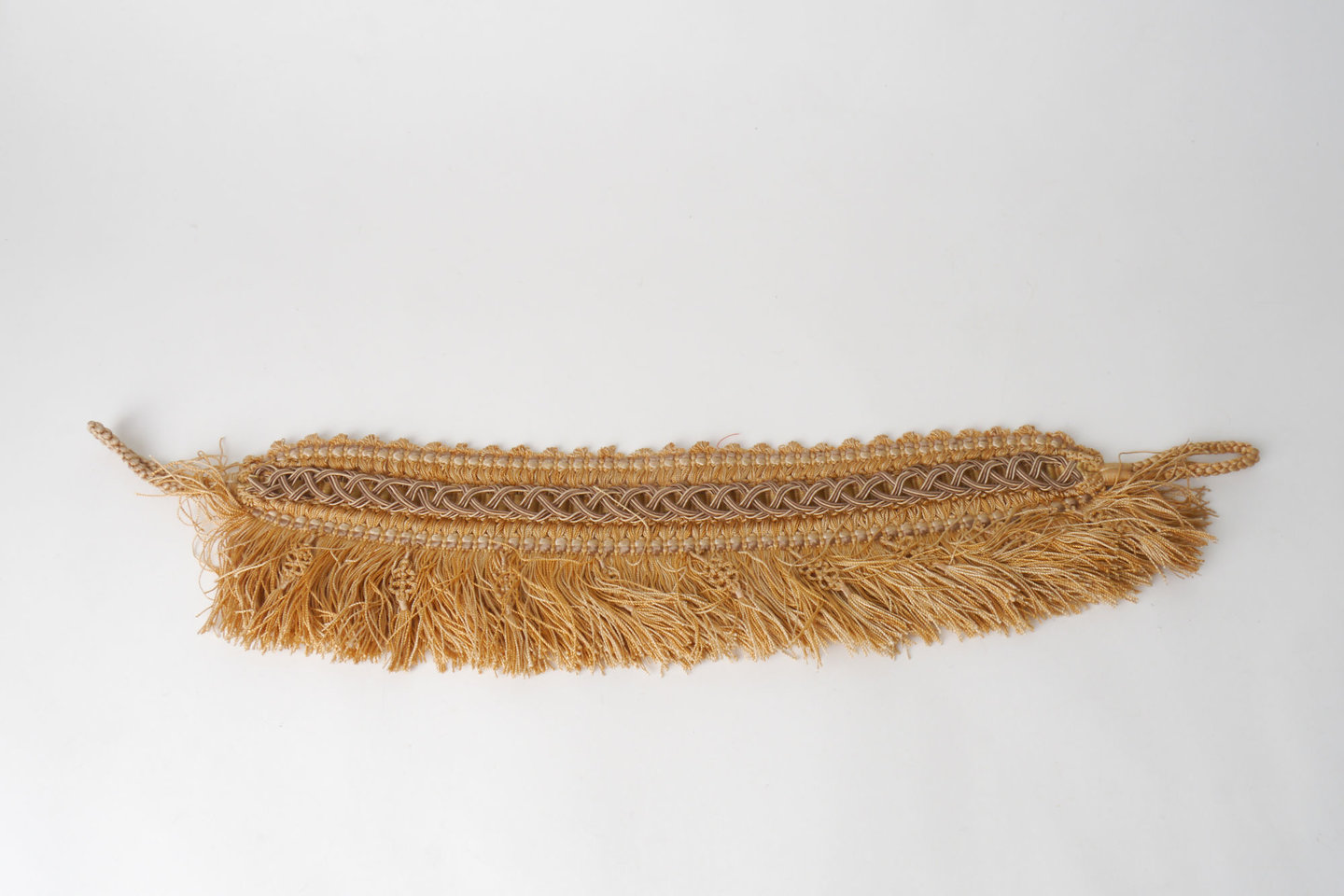 Vlakke embrasse met frange om gordijn open te houden