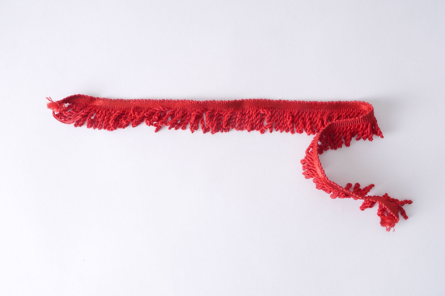 Frange als onderdeel voor het vervaardigen van passement