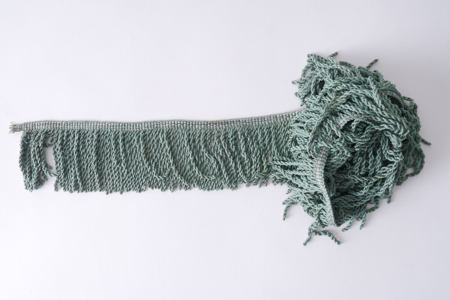 Frange als onderdeel voor het vervaardigen van passement