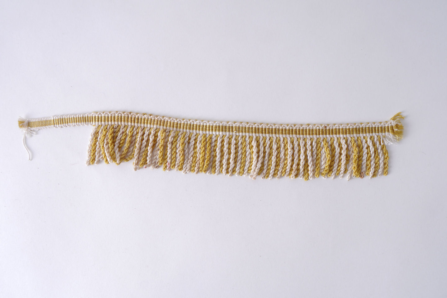 Frange als onderdeel voor het vervaardigen van passement