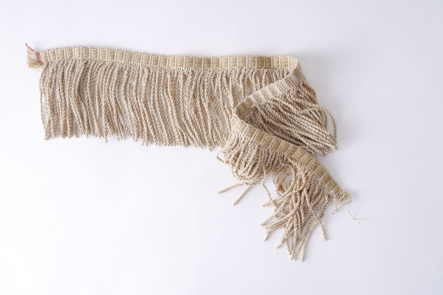 Frange als onderdeel voor het vervaardigen van passement