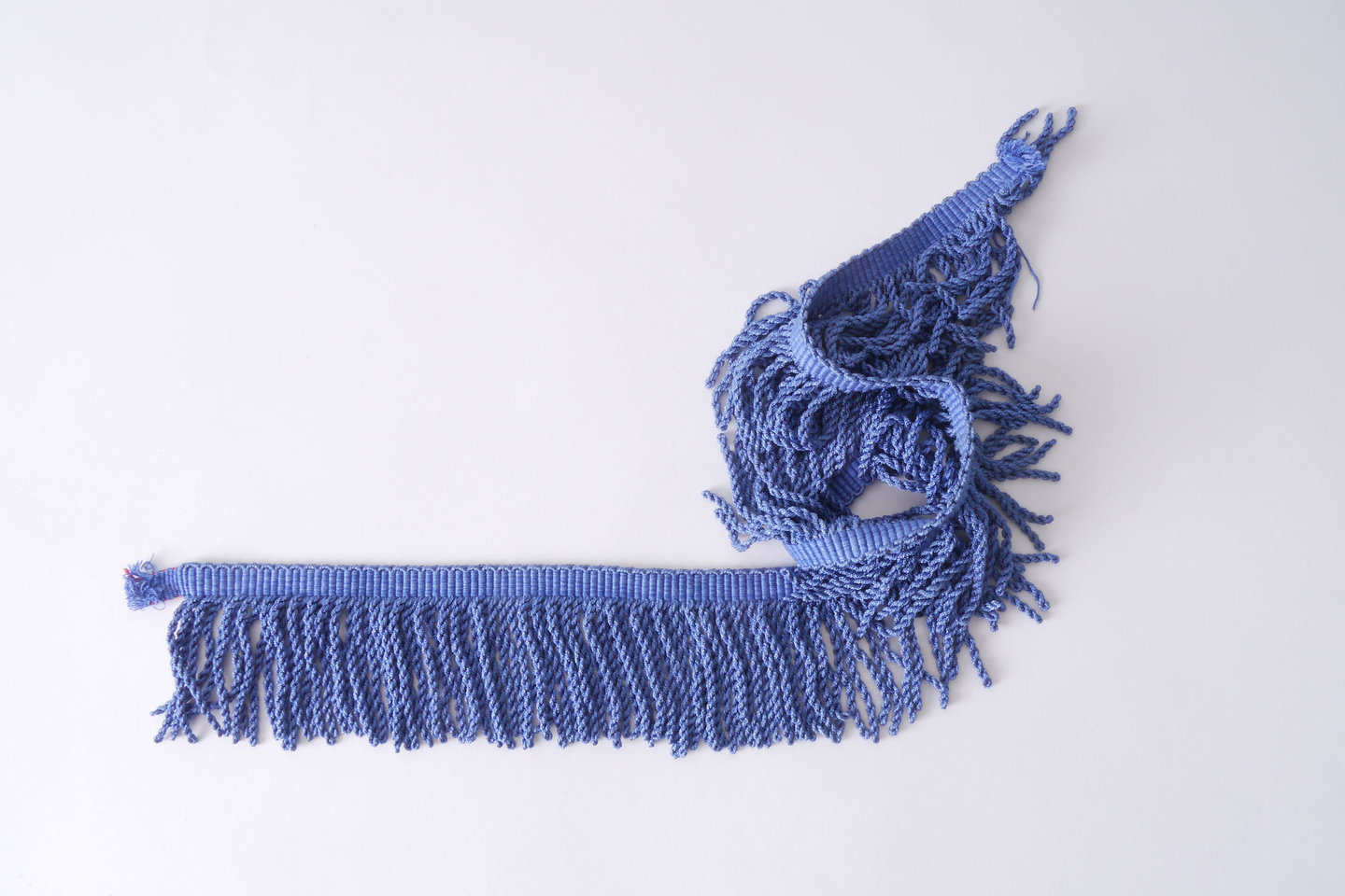 Frange als onderdeel voor het vervaardigen van passement