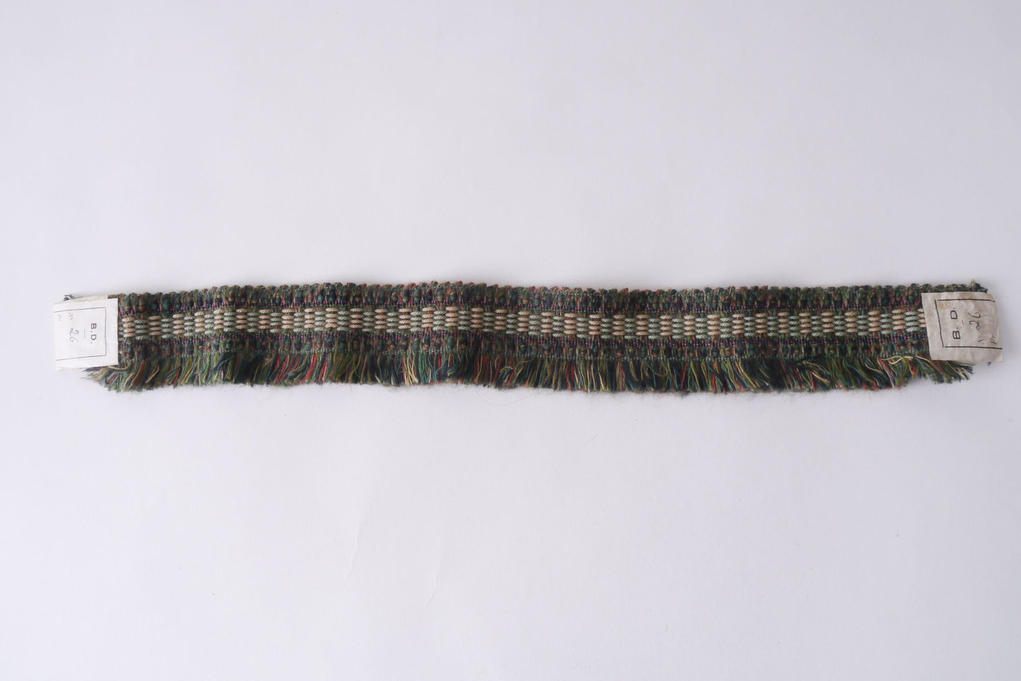 Effilé als onderdeel voor het vervaardigen van passement