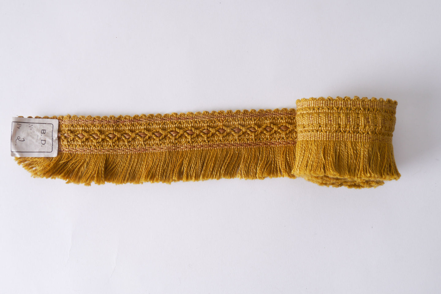 Effilé als onderdeel voor het vervaardigen van passement