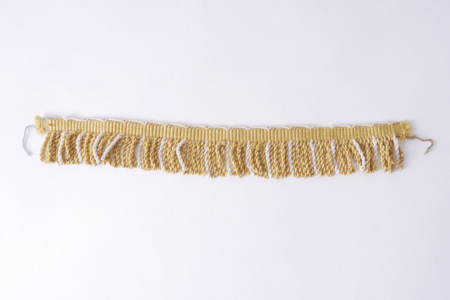 Frange als onderdeel voor het vervaardigen van passement