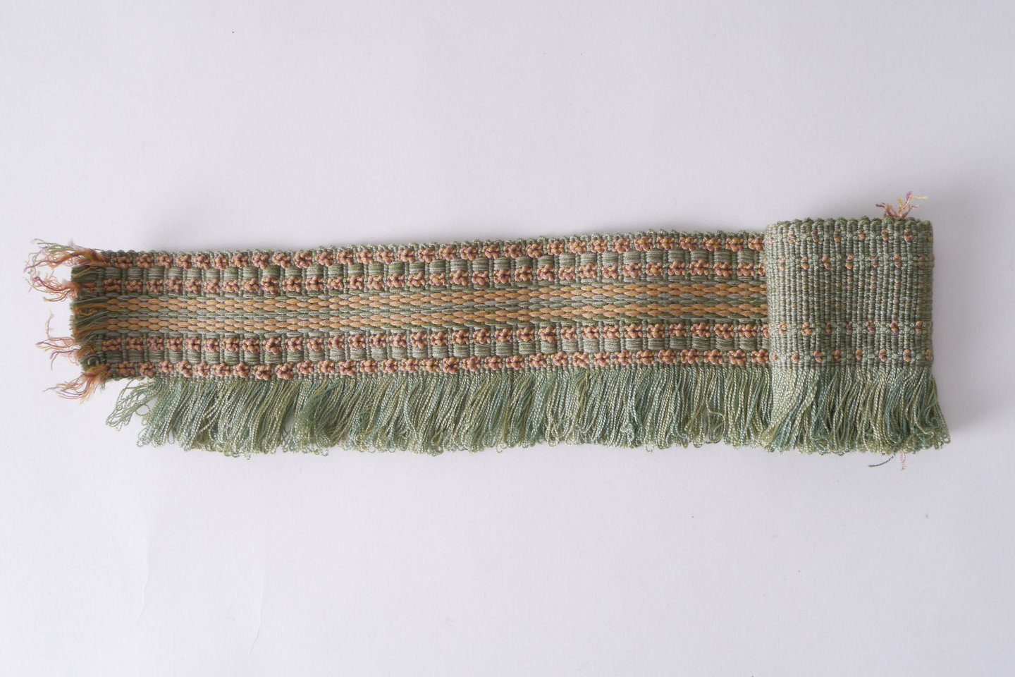 Effilé als onderdeel voor het vervaardigen van passement