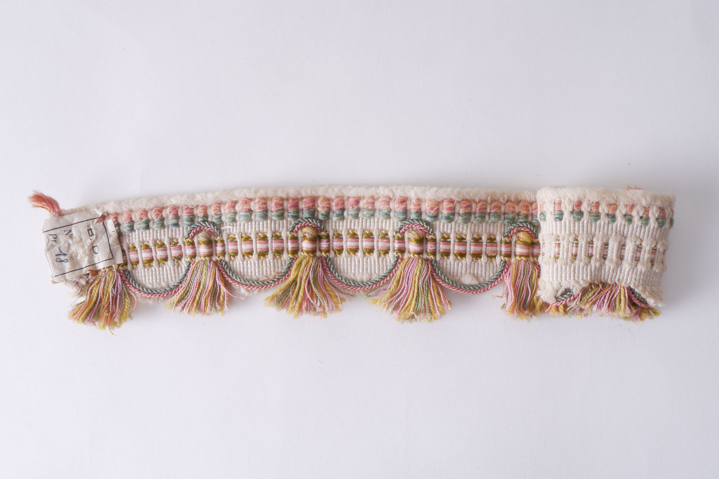 Effilé als onderdeel voor het vervaardigen van passement