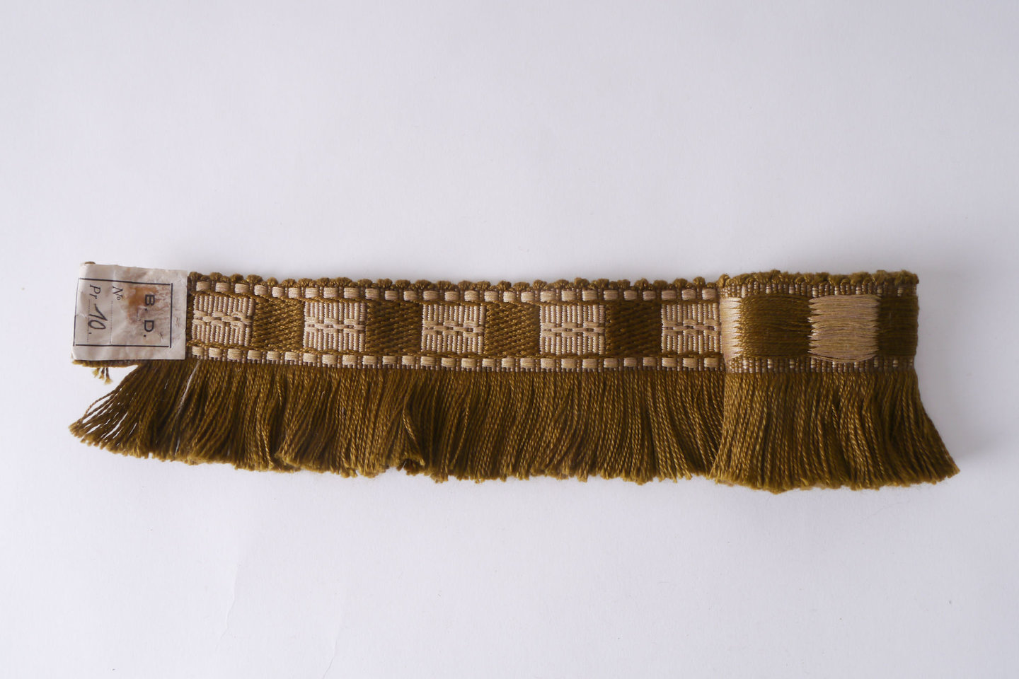 Effilé als onderdeel voor het vervaardigen van passement