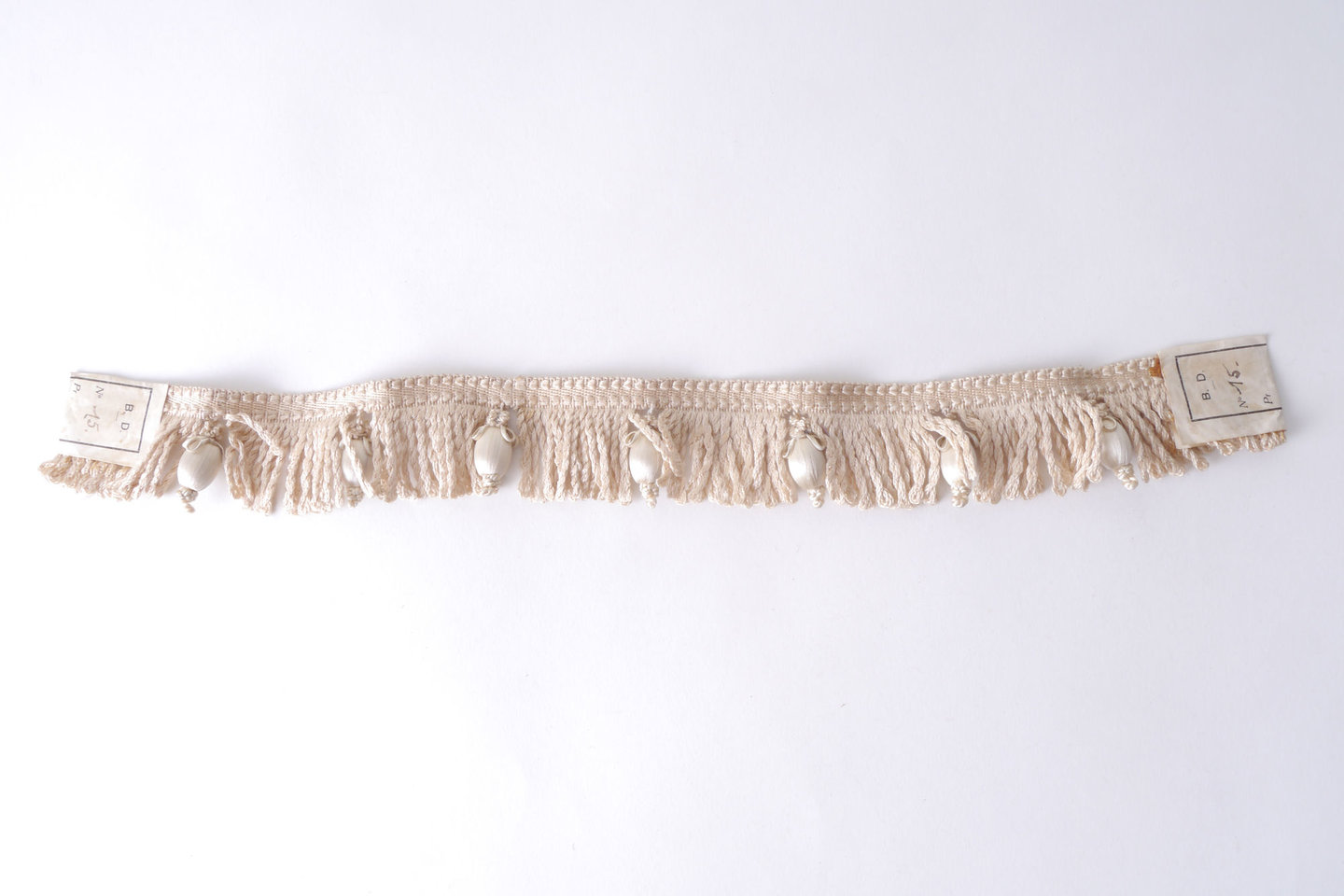 Effilé als onderdeel voor het vervaardigen van passement