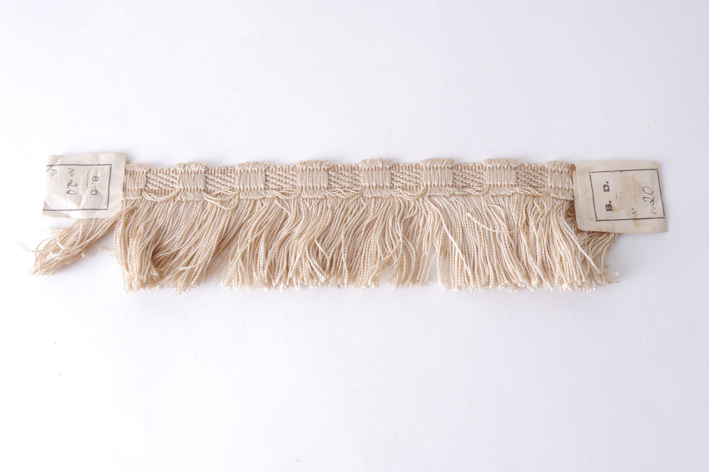 Effilé als onderdeel voor het vervaardigen van passement