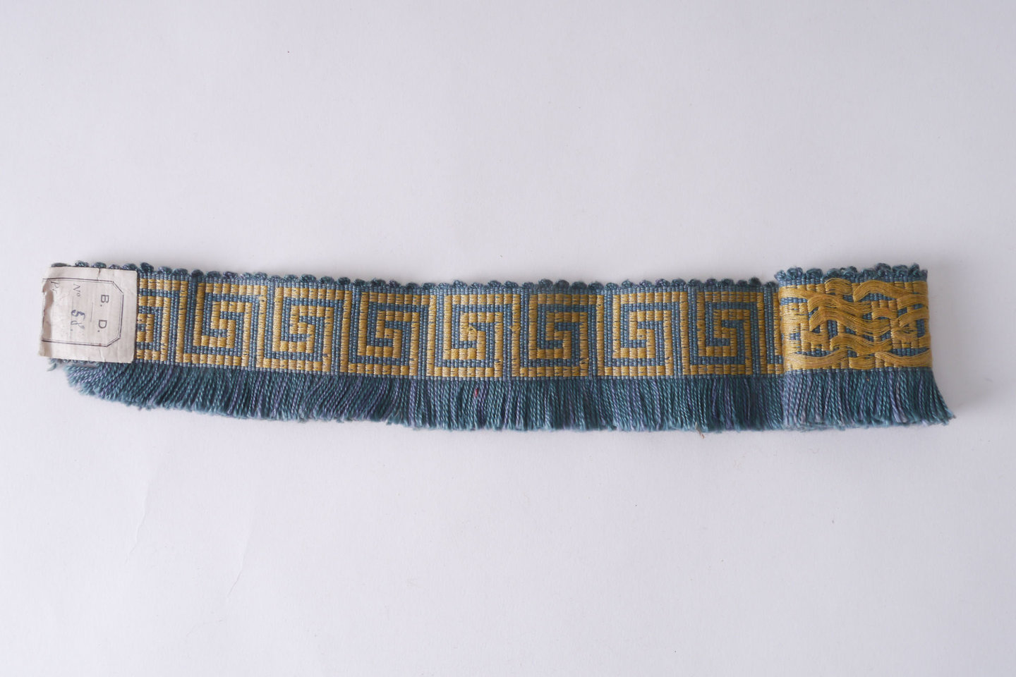 Effilé als onderdeel voor het vervaardigen van passement