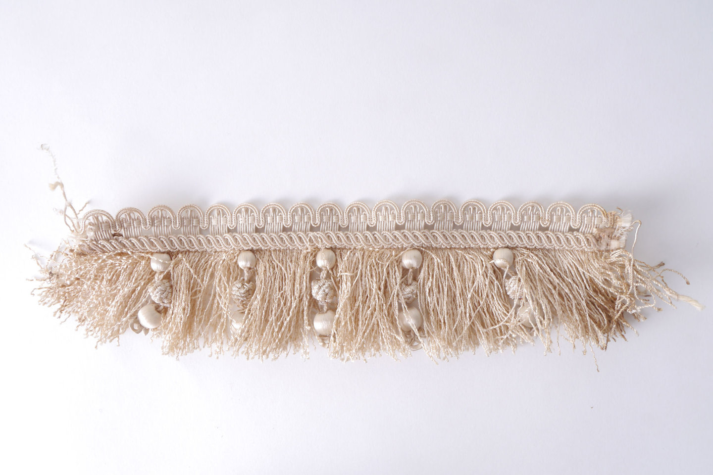 Effilé als onderdeel voor het vervaardigen van passement